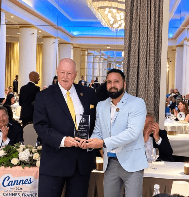 Hardesh Bhardwaj receiving the Investigator of the Year Award 2026 on stage in Cannes
